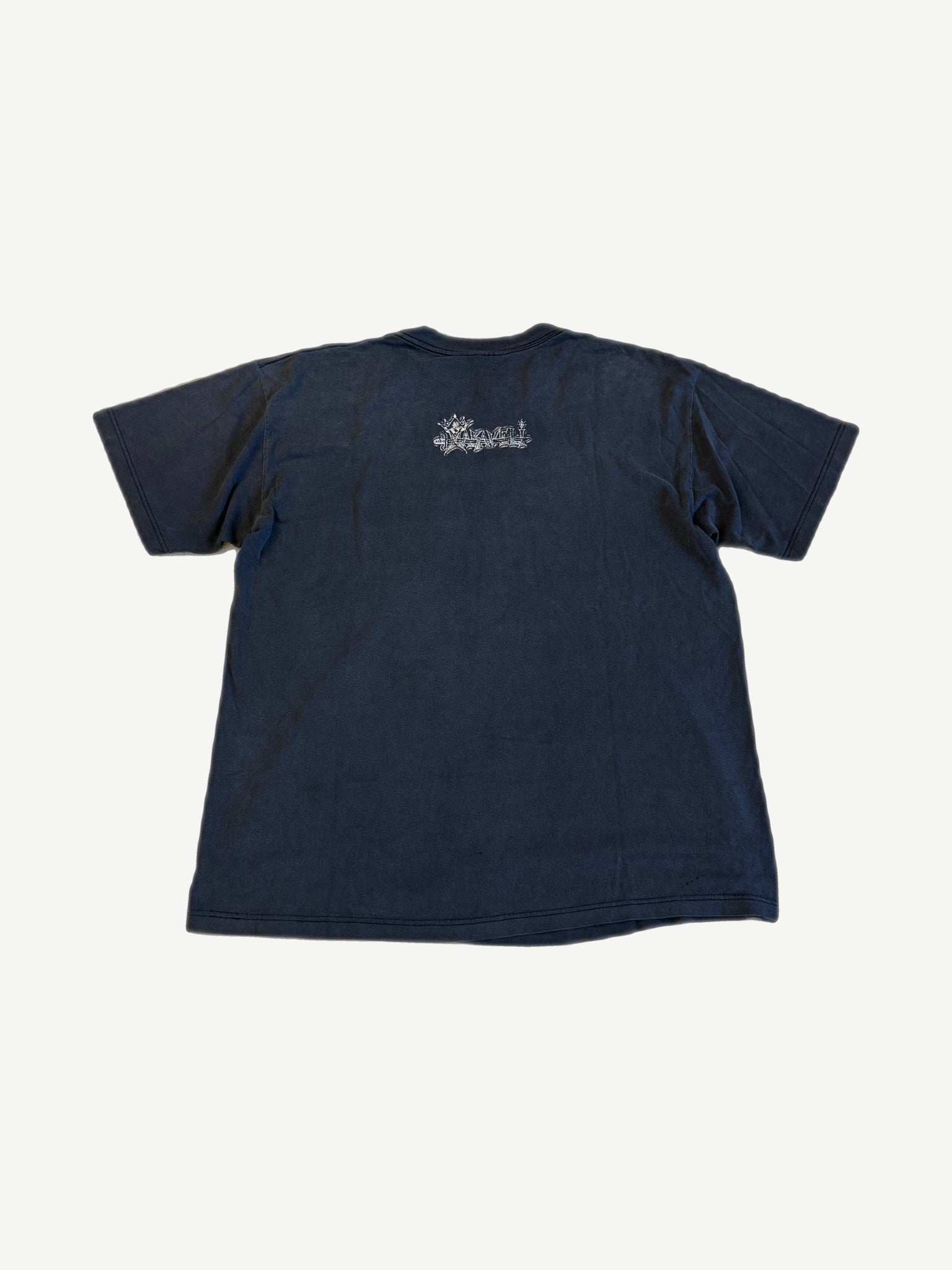 Vintage Tupac Makaveli memorial tee back with small graffiti-style Makaveli logo print at upper center