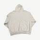 Balenciaga cream surfer logo hoodie back view with distressed hem edges and oversized boxy silhouette