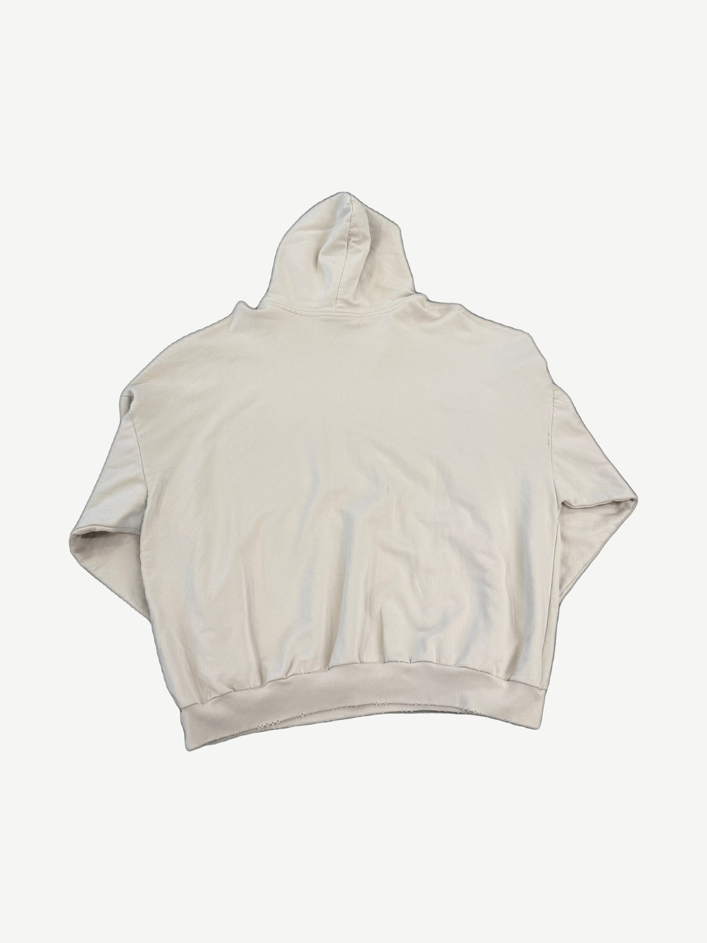 Balenciaga cream surfer logo hoodie back view with distressed hem edges and oversized boxy silhouette