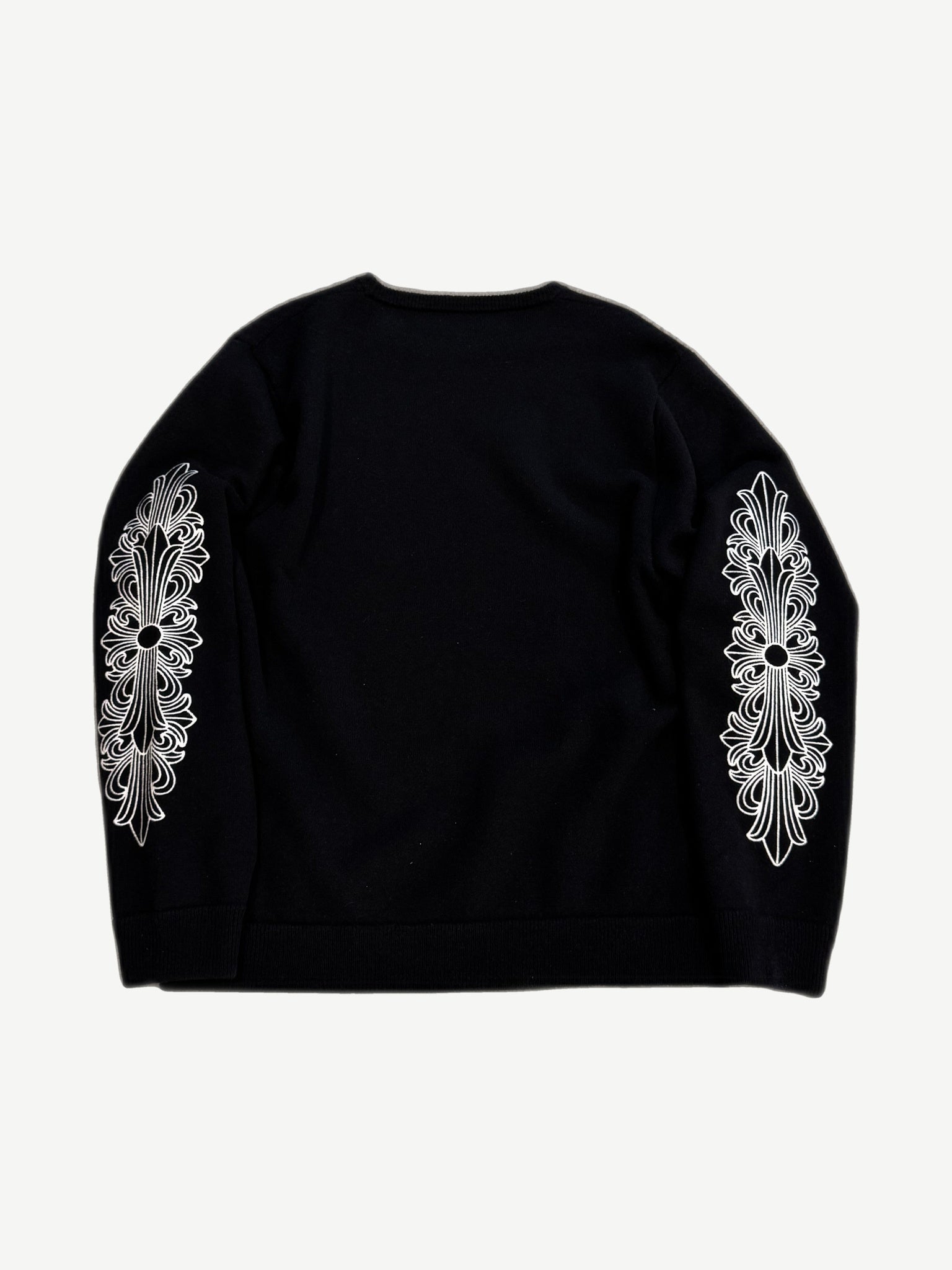 Chrome Hearts black cashmere crewneck back view with white floral cross dagger embroidery on each sleeve