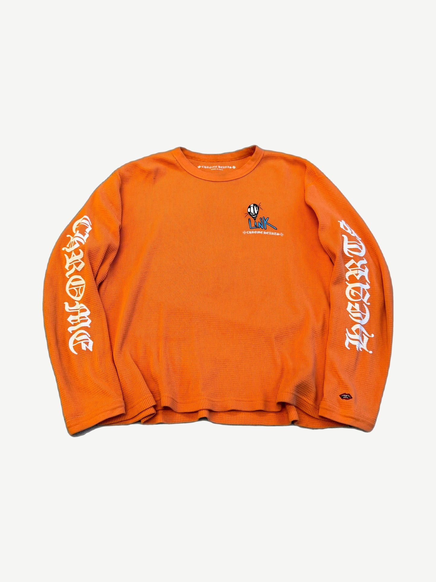 Chrome Hearts Matty Boy orange waffle thermal longsleeve with LINK smiley chest and gothic sleeve print