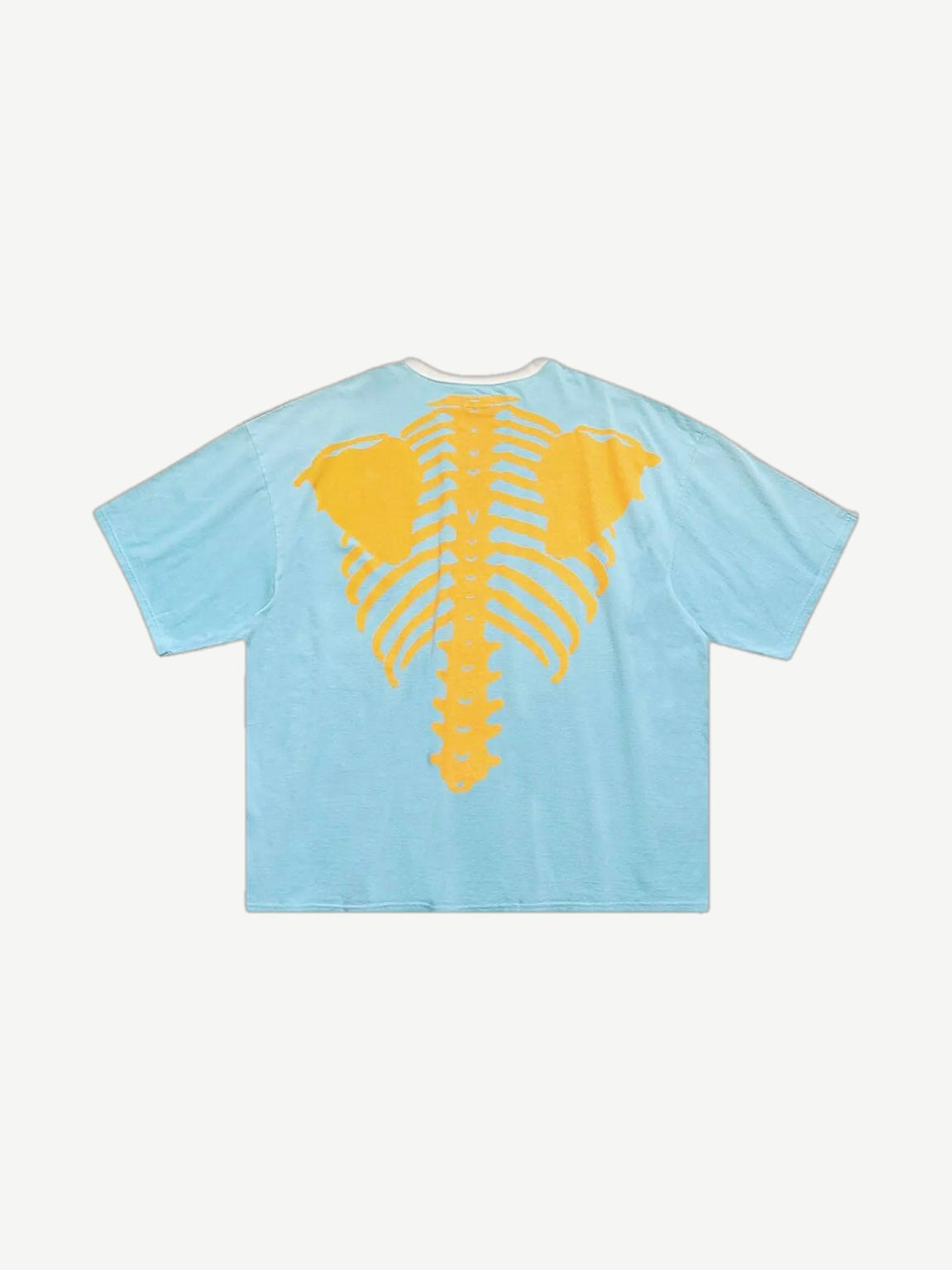 Kapital Bone 2 Tone tee back showing light blue body with bold yellow skeleton ribcage and spine graphic.