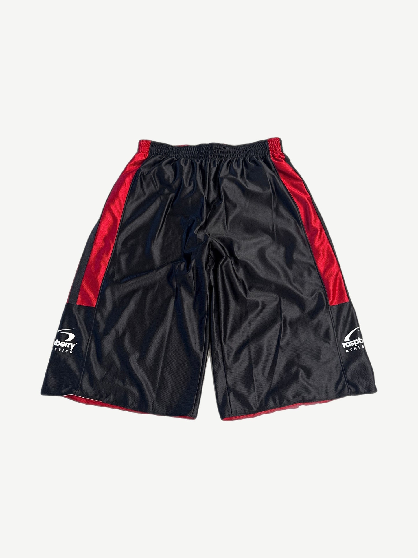 GV Gallery TJ Ford reversible shorts flipped to black side with red basketball mesh trim and printed graphics