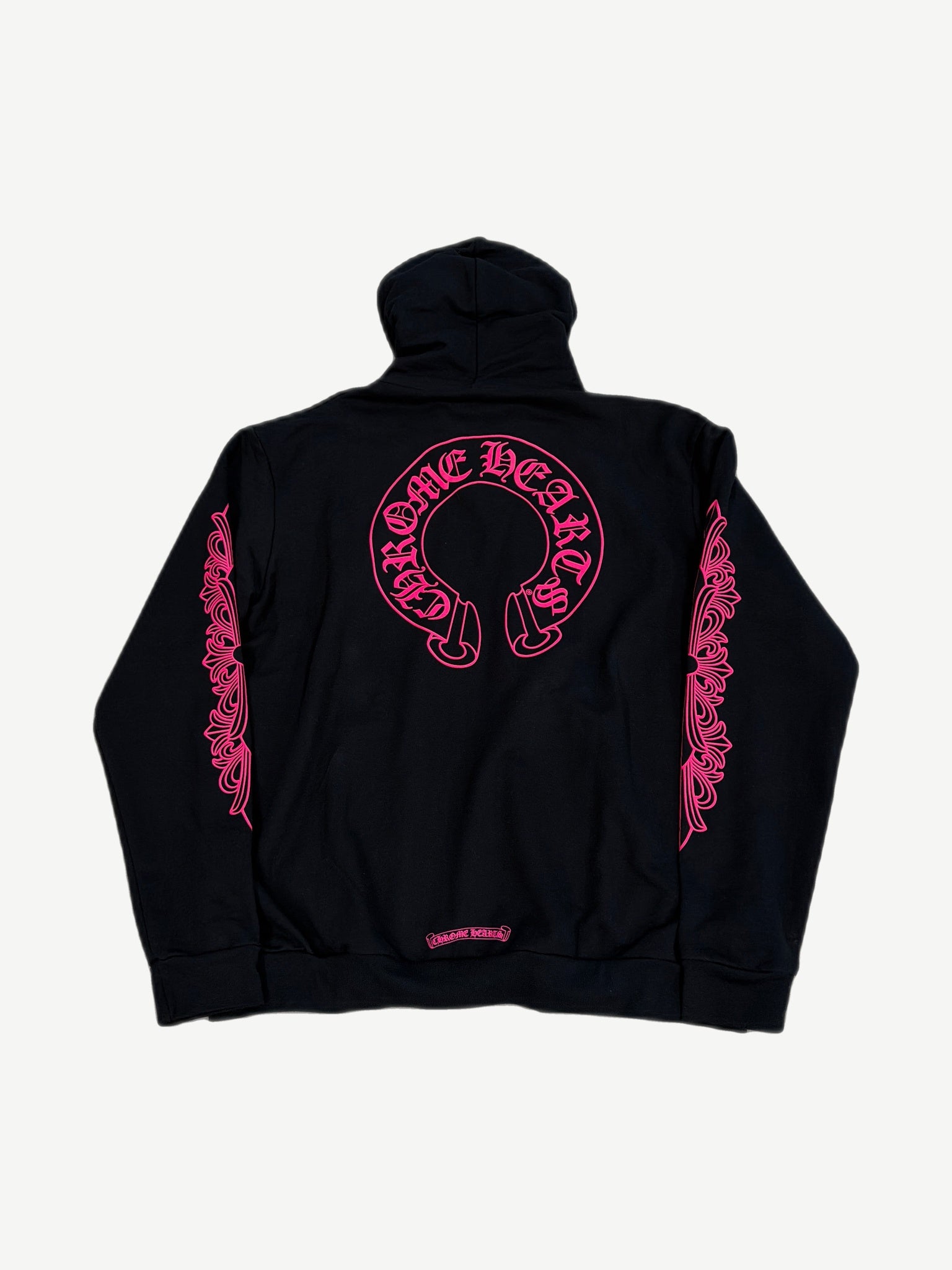 Chrome Hearts black hoodie back showing large pink horseshoe logo and gothic Chrome Hearts script.