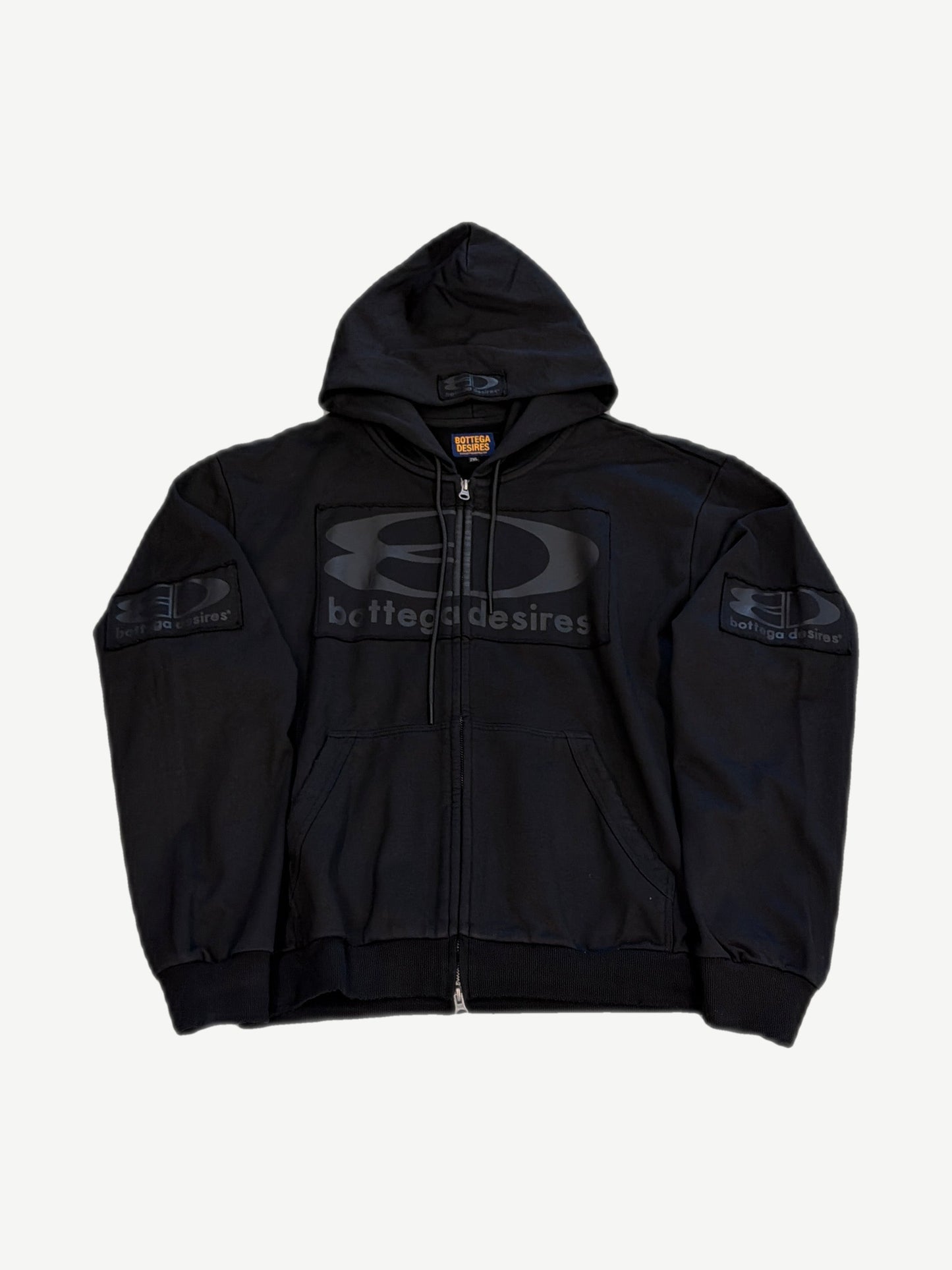 Bottega Desires black tech zip-up hoodie with tonal racing-style logo panel and embroidered sleeve patches