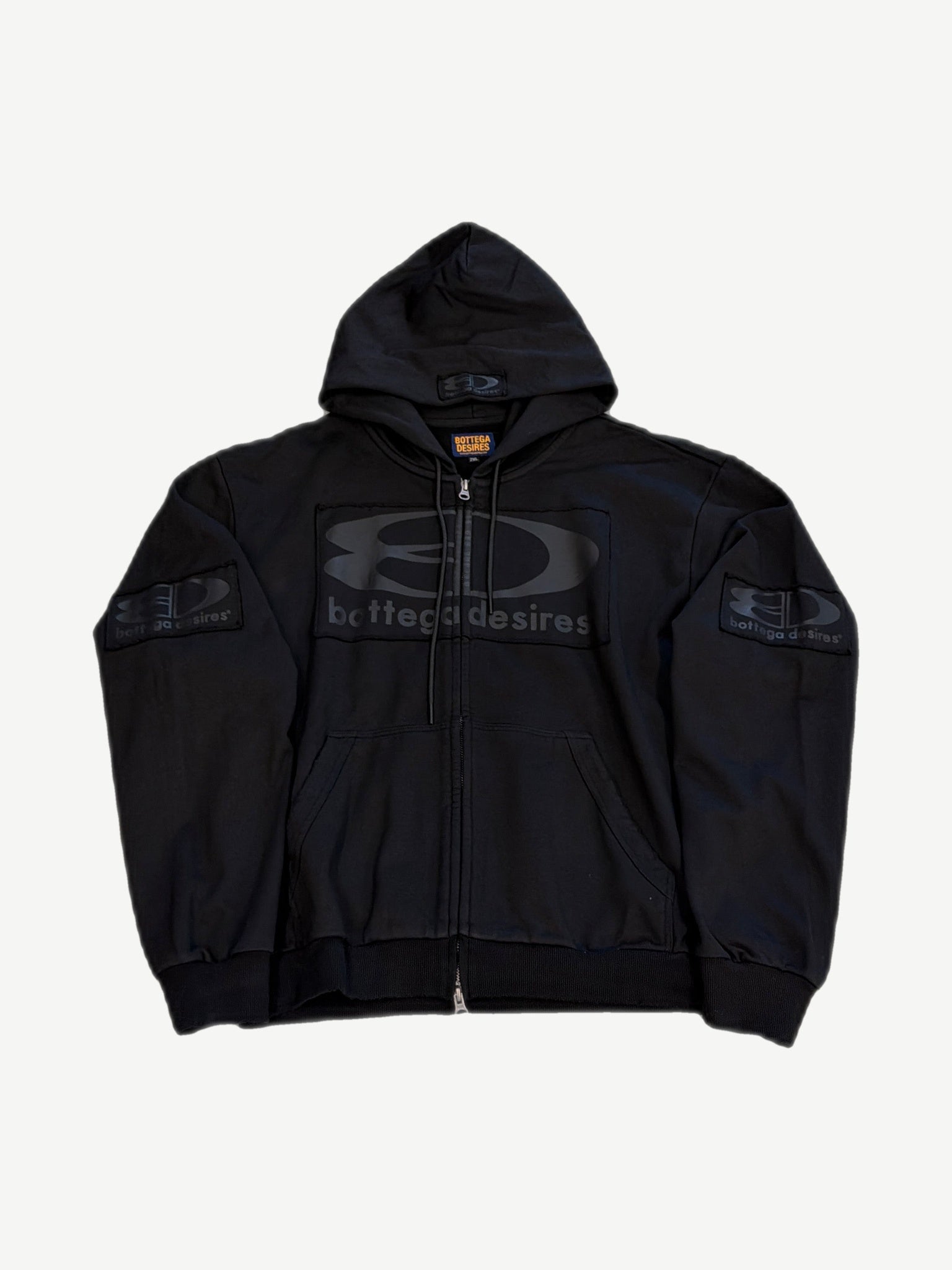 Bottega Desires black tech zip-up hoodie with tonal racing-style logo panel and embroidered sleeve patches