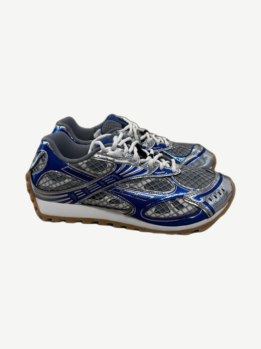 Bottega Veneta Orbit sneakers side view, navy and metallic silver mesh upper on white and gum runner sole
