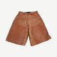 GV Gallery Raspberry Hills Mojave leather shorts front view, tan brown panels with snap closure