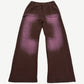 Back of HMDD brown sweatpants showing faded purple sun-bleached fade across seat and rear pockets.