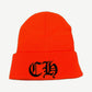 Chrome Hearts orange beanie with black gothic CH logo embroidery, folded cuff, front view.
