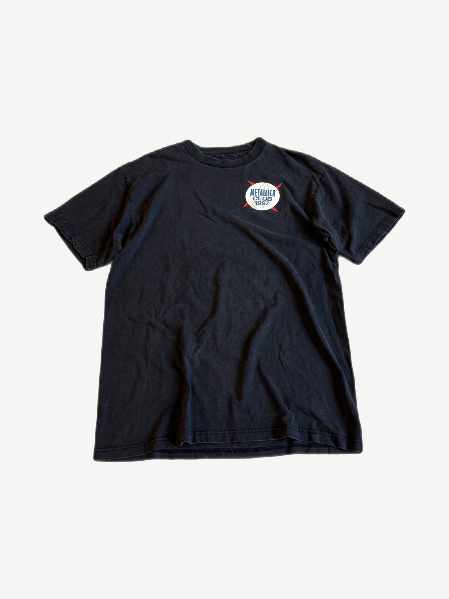 Vintage Metallica Club 1997 tee front in faded black with small embroidered chest logo and worn cotton