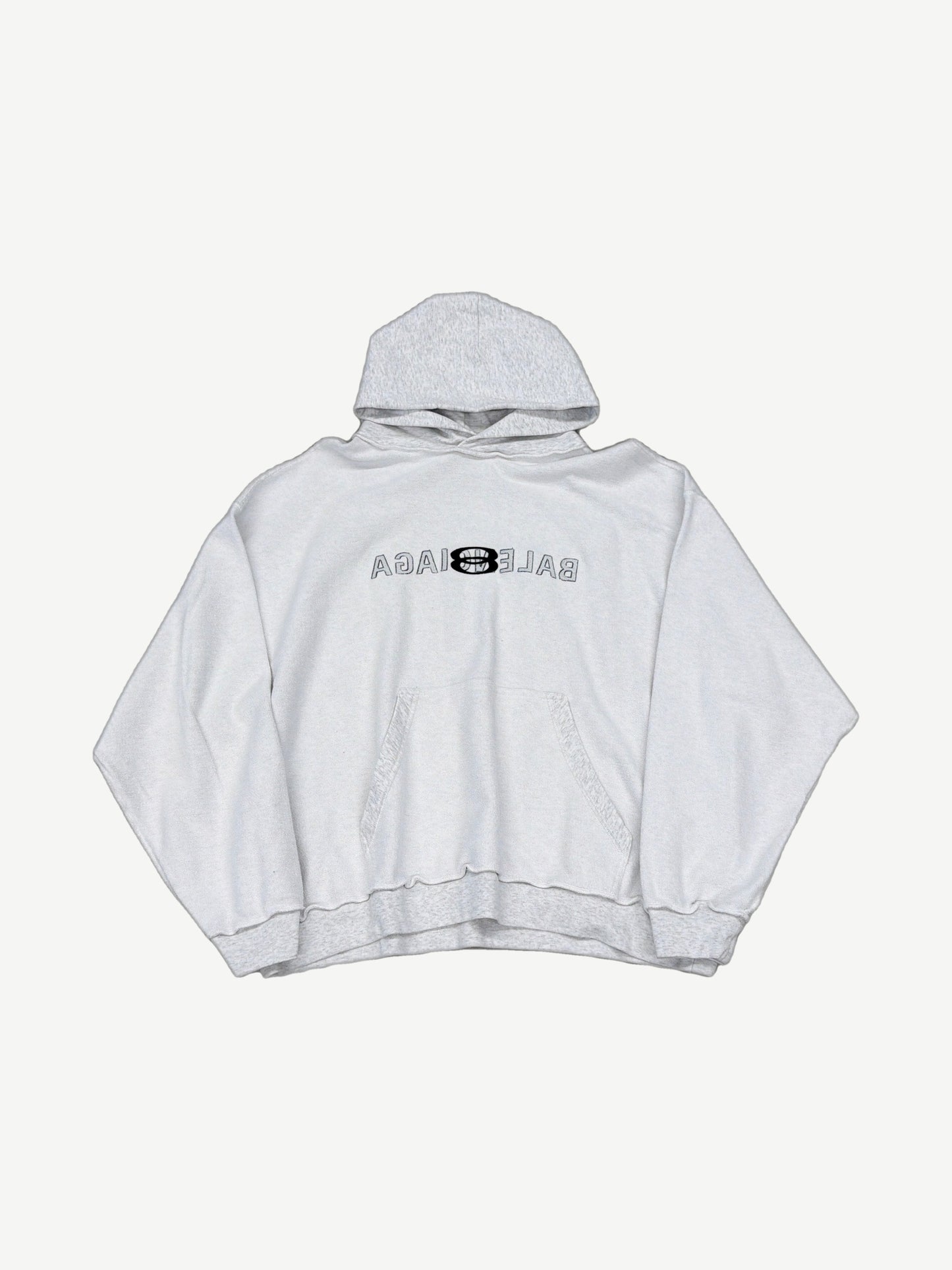 Balenciaga light grey inside out hoodie with reversed Balenciaga logo print and exposed seam construction