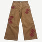 Happy Memories Don't Die HMDD tan corduroy pants front with stacked red HMDD monogram patches on legs