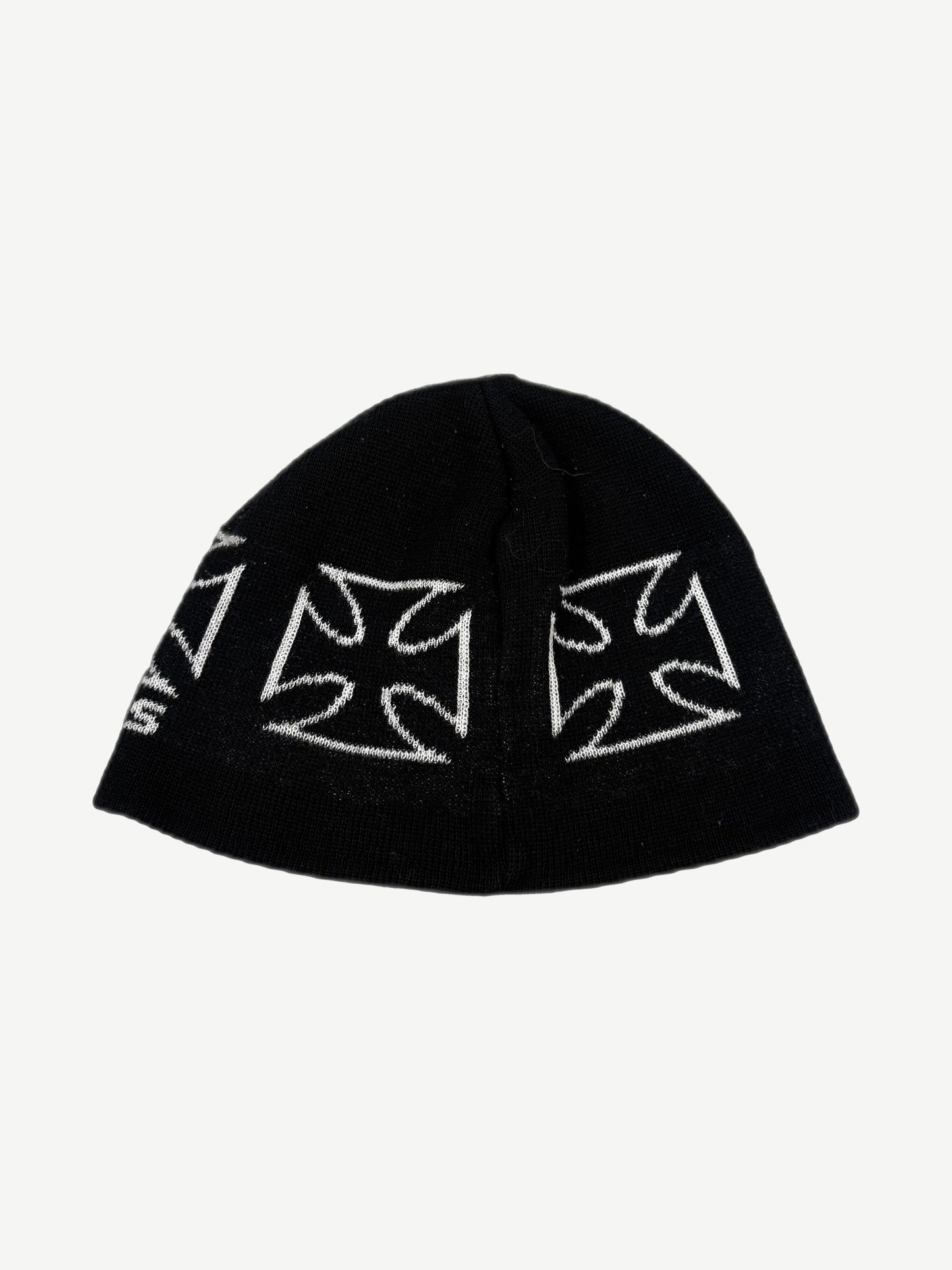 West Coast Choppers black beanie top view showing repeating white iron cross knit pattern.