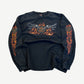 Vintage Harley Davidson black longsleeve with winged motors Arkansas chest graphic and orange flame print.