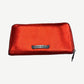 Chrome Hearts red metallic leather long wallet back view with engraved silver Chrome Hearts logo plaque