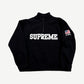 Supreme black half-zip pullover with white varsity text, US flag and Bowery patch on chest