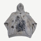 Back of Balenciaga gray tattoo hoodie showing large central angel print and scattered tattoo-style graphics