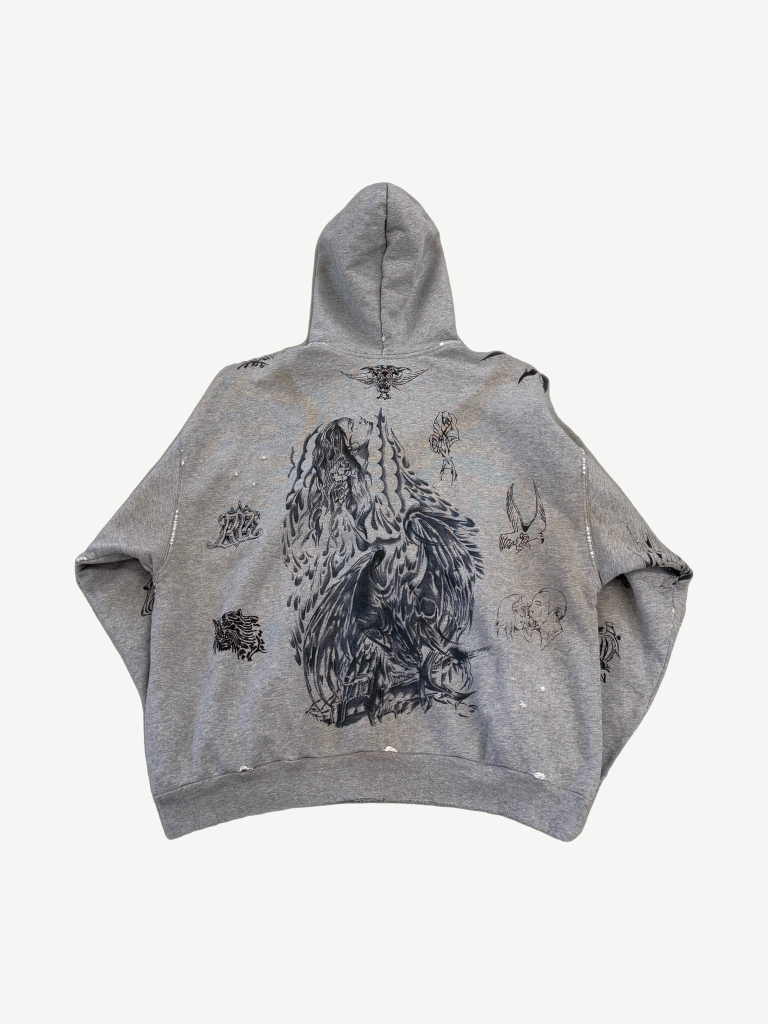Back of Balenciaga gray tattoo hoodie showing large central angel print and scattered tattoo-style graphics