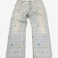 Louis Vuitton x Tyler the Creator denim jeans, mid-wash blue with tonal LV monogram jacquard pattern, straight leg.