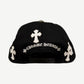 Chrome Hearts gray baseball cap side angle, black panels and embroidered CH cross patch detail
