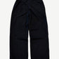 Bottega Desires black tech sweatpants back view, sleek nylon construction with rear welt pocket and tapered cuffs.