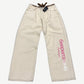 GV Gallery Raspberry Hills cream Neapolitan baggy denim jeans with pink Cyrillic Raspberry logo down right leg