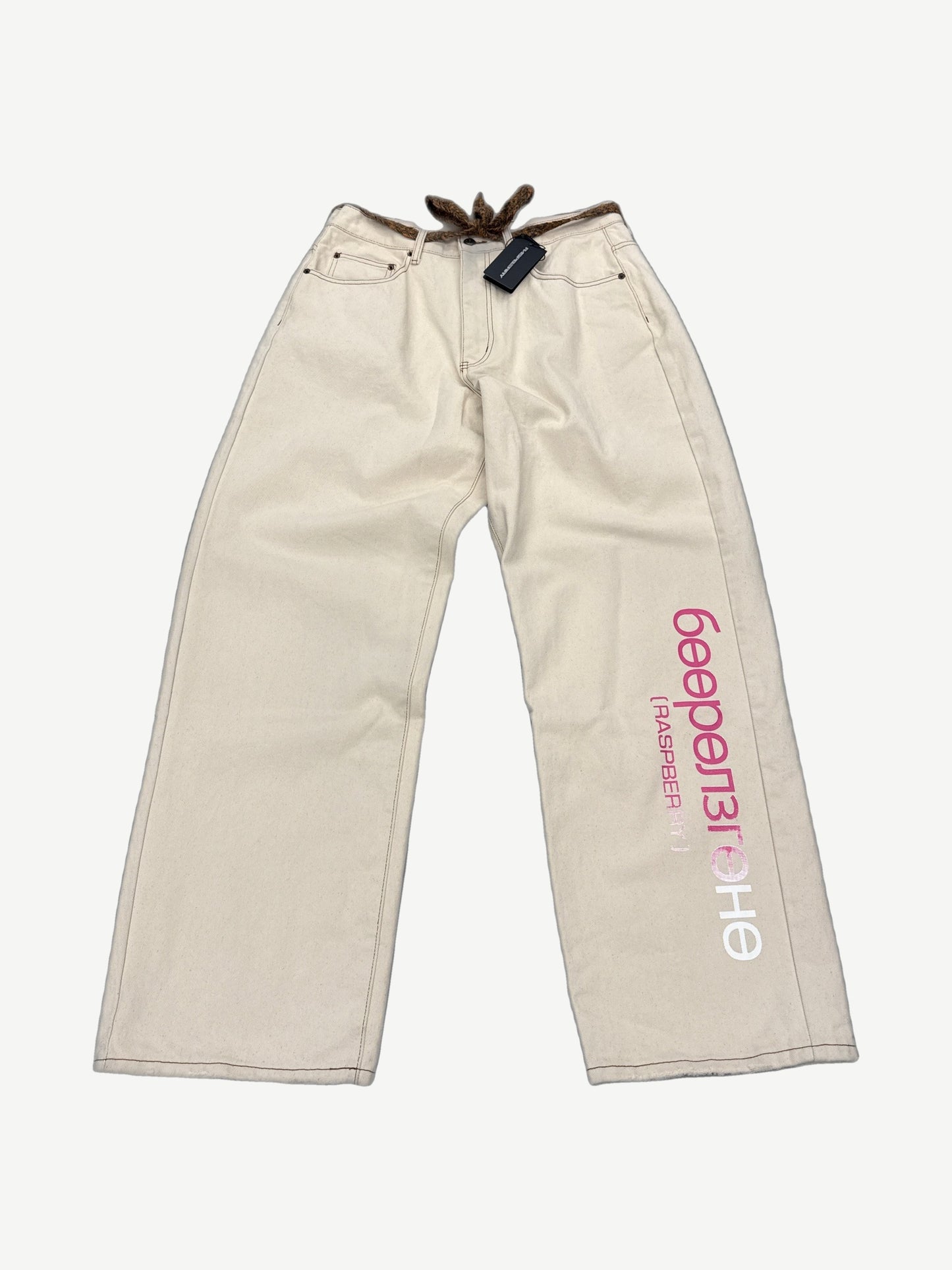 GV Gallery Raspberry Hills cream Neapolitan baggy denim jeans with pink Cyrillic Raspberry logo down right leg