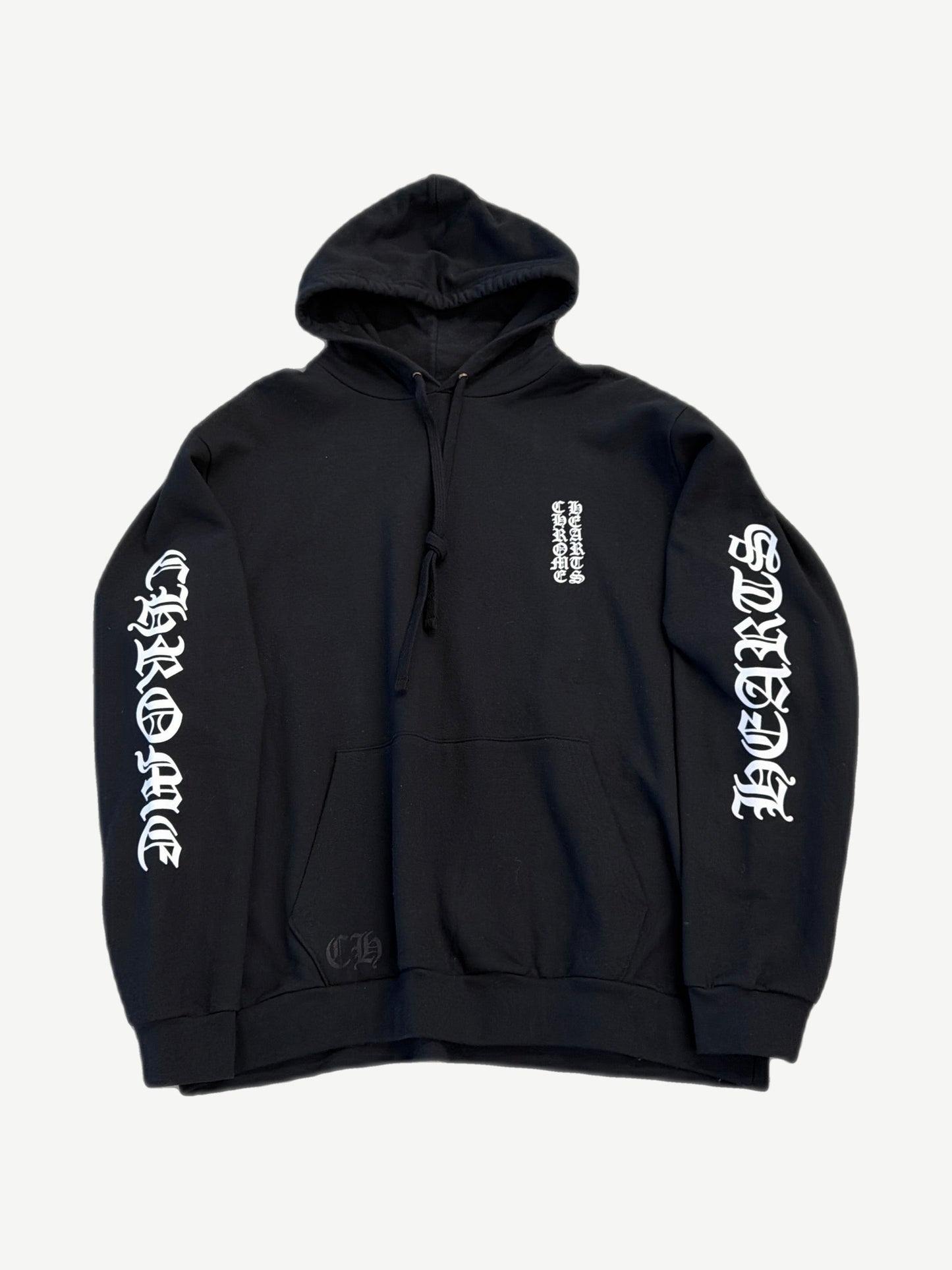 Chrome Hearts black hoodie with vertical white CHROME HEARTS gothic logo down sleeve and chest.