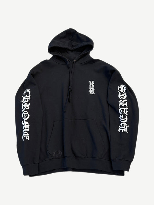 Chrome Hearts black hoodie with vertical white CHROME HEARTS gothic logo down sleeve and chest.