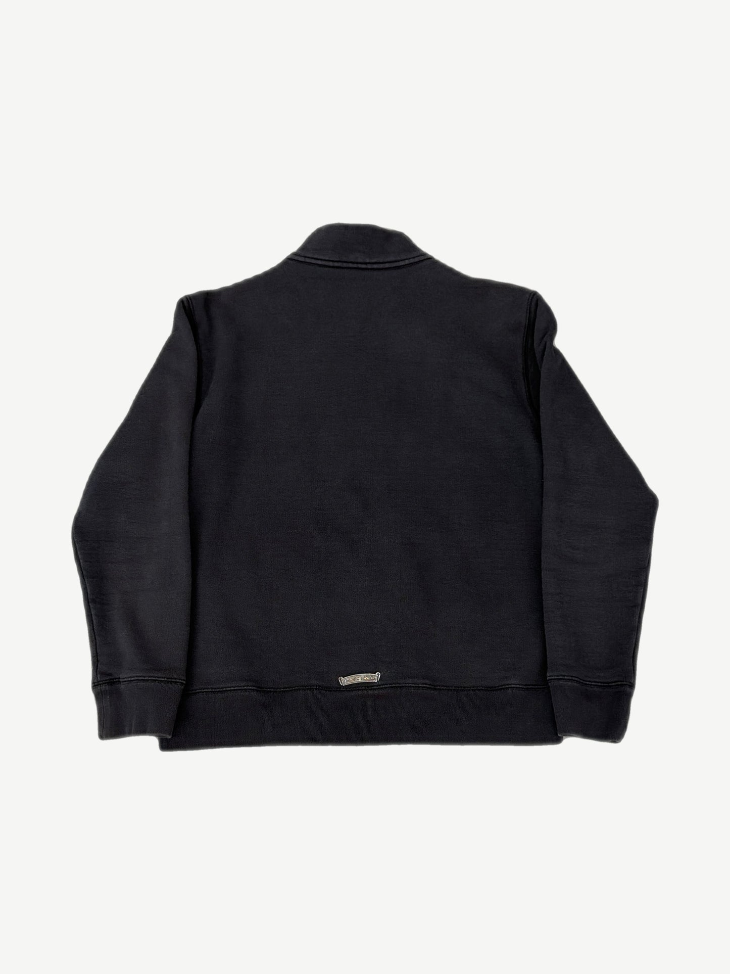 Chrome Hearts black half-zip back view with sterling silver dagger plaque at hem and clean mock-neck collar