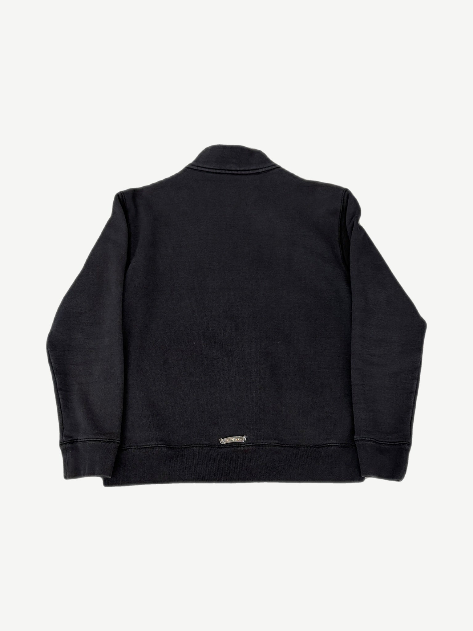 Chrome Hearts black half-zip back view with sterling silver dagger plaque at hem and clean mock-neck collar