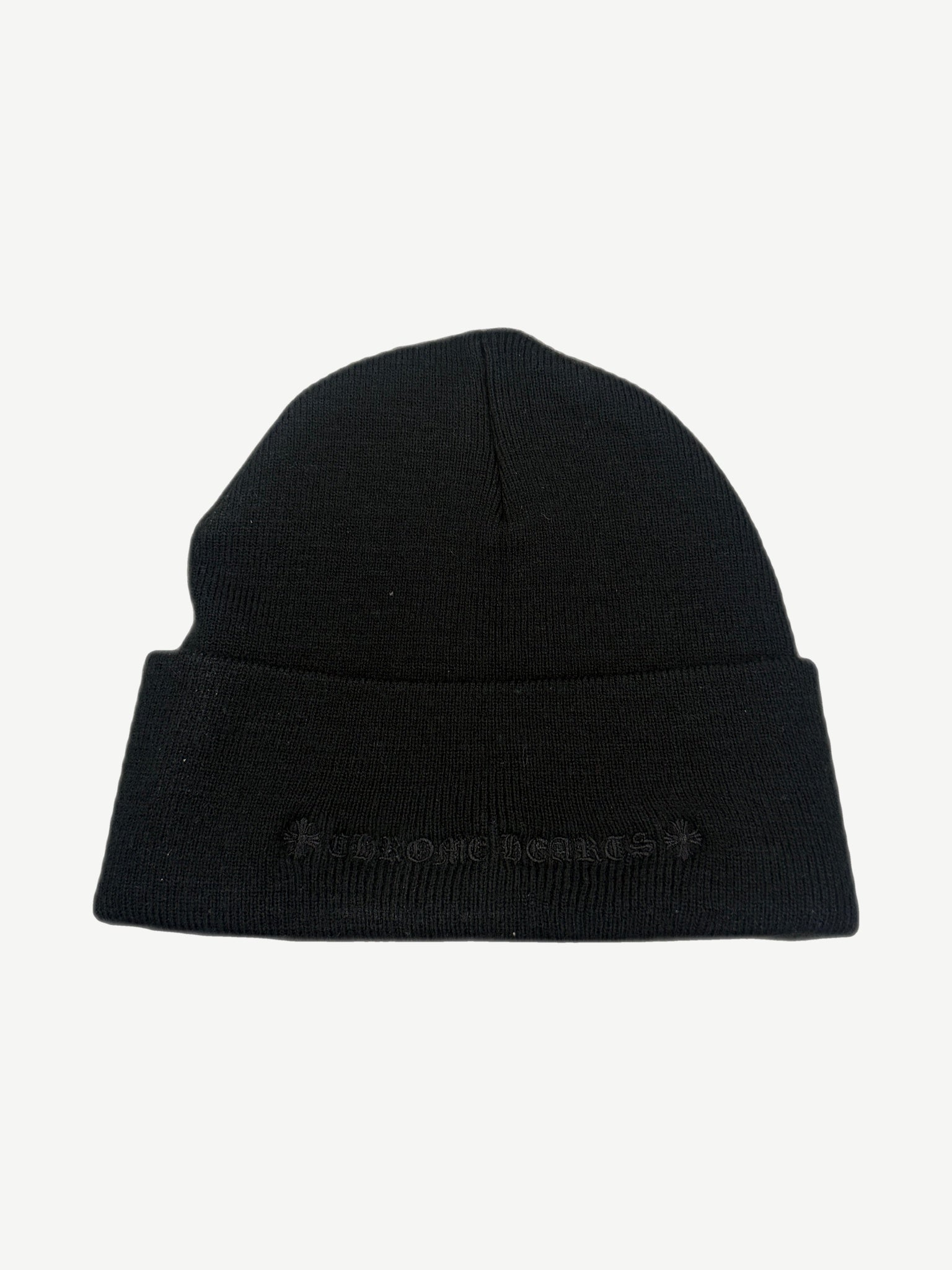 Chrome Hearts black knit beanie back view with tonal Chrome Hearts gothic script and cross daggers along cuff.