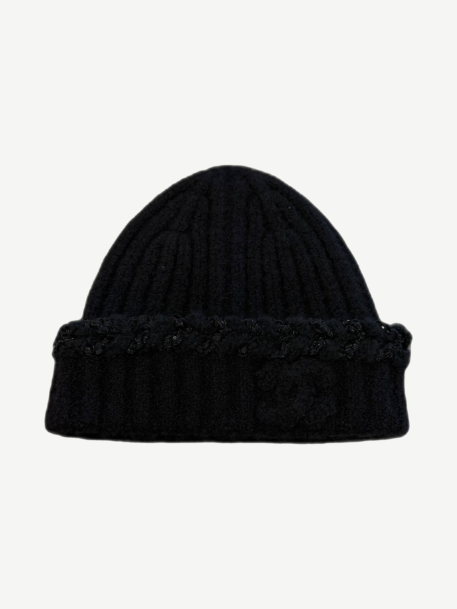 Black Chanel cashmere ribbed beanie with tonal embossed interlocking CC logo and sequin shimmer detail.