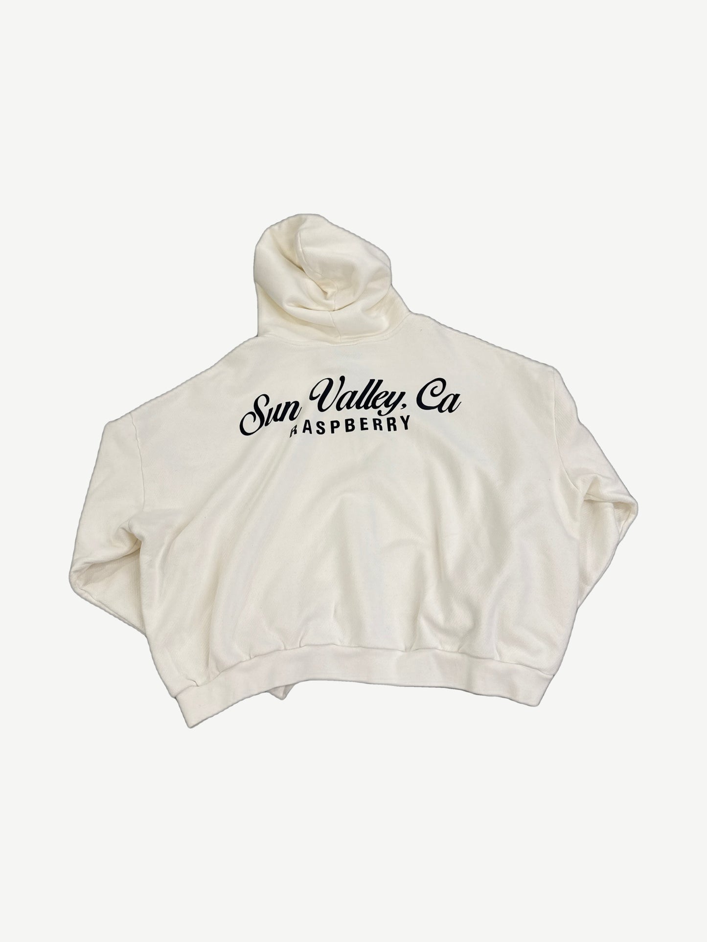 Raspberry Hills cream zipup back with large Sun Valley CA cursive script print across shoulders