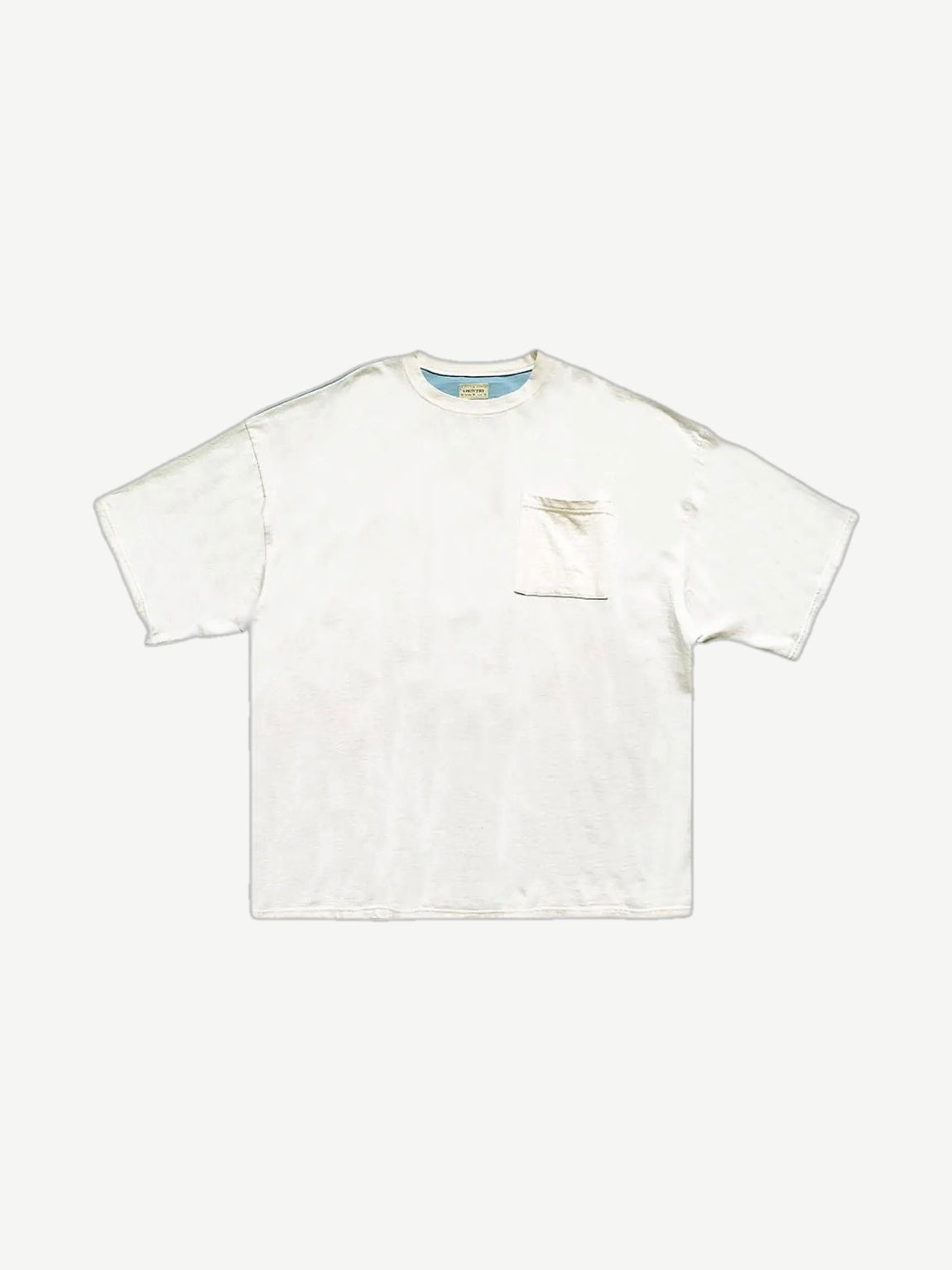 Kapital Bone 2 Tone pocket tee front view in cream with blue Country tag and chest pocket detail.