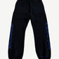Chrome Hearts black sweatpants back view with blue gothic Chrome Hearts text down legs and welt back pockets