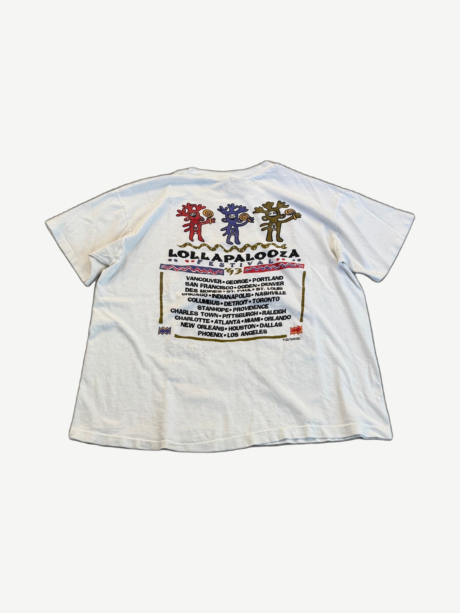 Back of vintage Lollapalooza festival tour tee with tour date listings and tonal logo print on cotton.