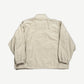 Supreme x Umbro stone track jacket back view with tonal Supreme logo across shoulders