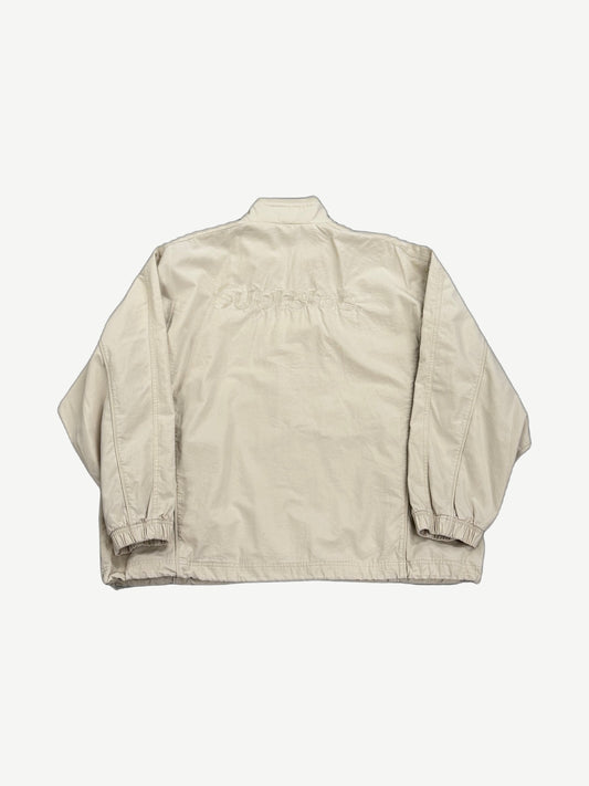 Supreme x Umbro stone track jacket back view with tonal Supreme logo across shoulders