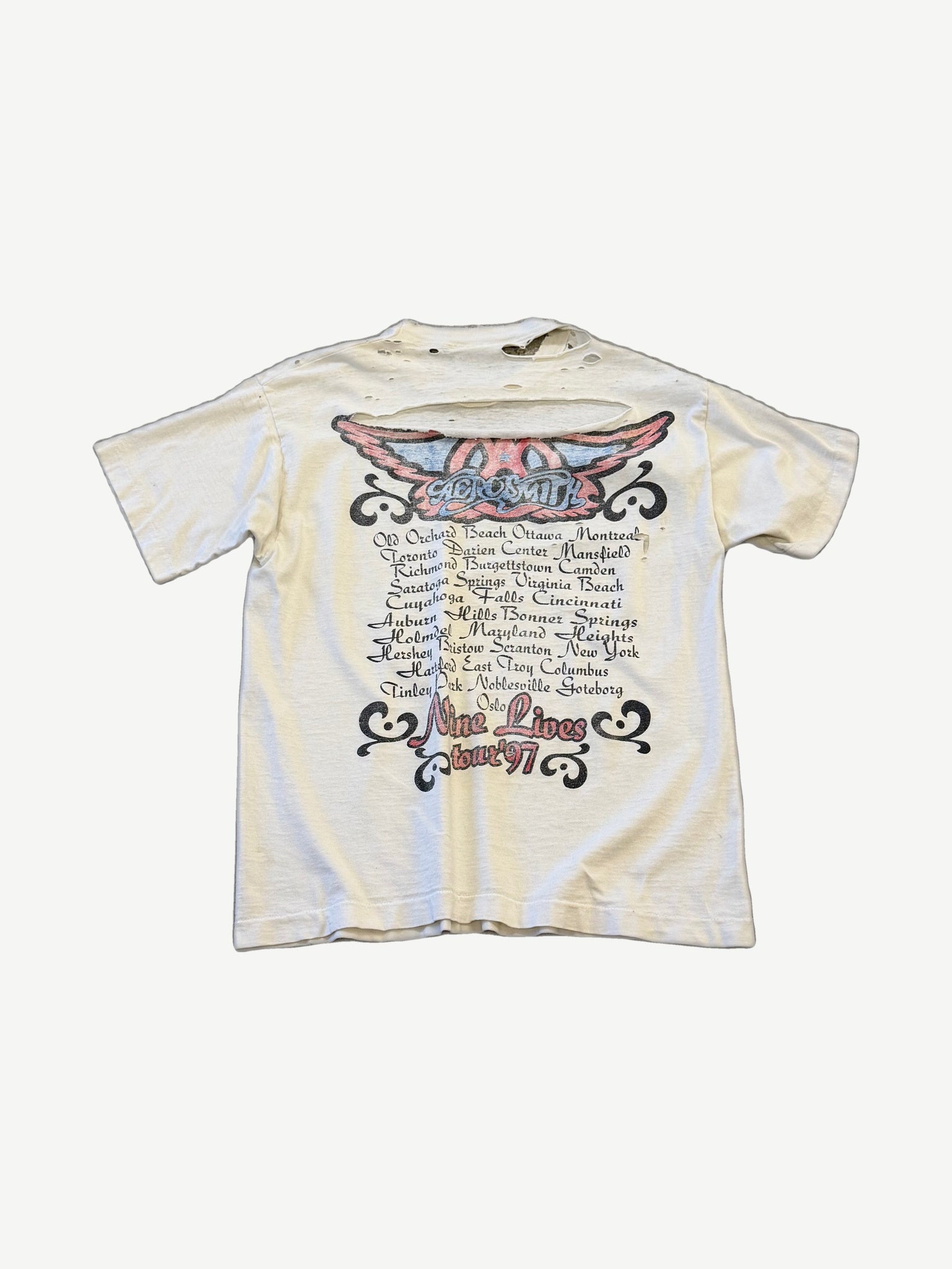 Vintage Aerosmith Nine Lives tour tee back view showing 1997 tour dates list on black cotton.