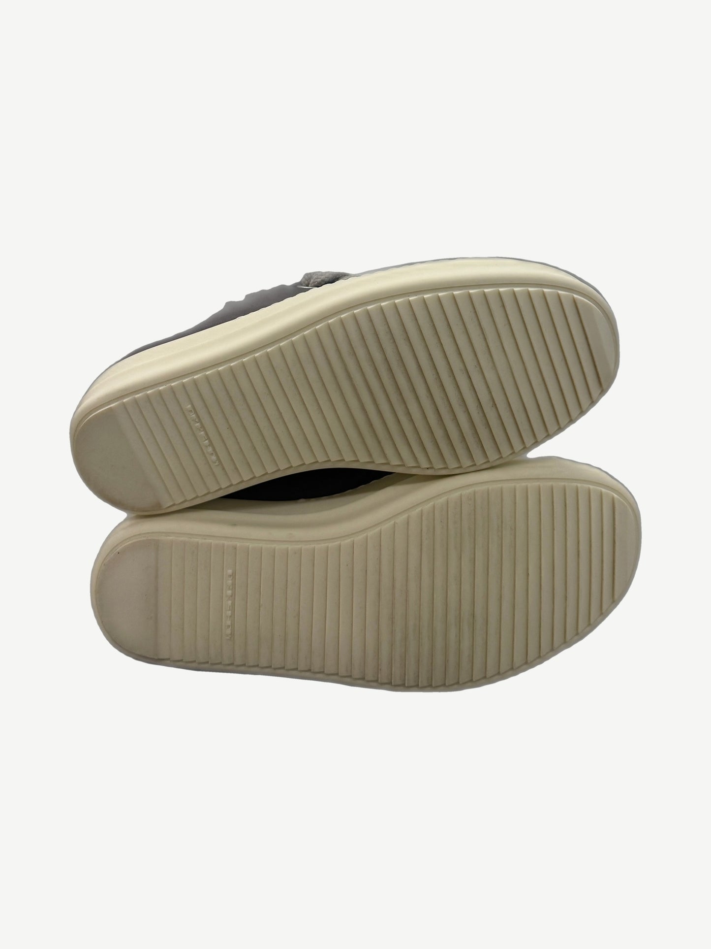 Rick Owens Dust low puffer sneaker heel and outsole detail with sculpted rubber tread and reinforced collar