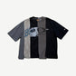 Bottega Desires Ransom tee with paneled black grey and beige vertical stripes and collaged face graphic