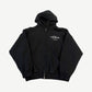 Balenciaga black Erewhon zip-up hoodie with red and white Erewhon Market logo print on chest.