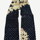 Louis Vuitton bleach monogram wide-leg jeans in black with gold bleach splatter wash across allover LV pattern