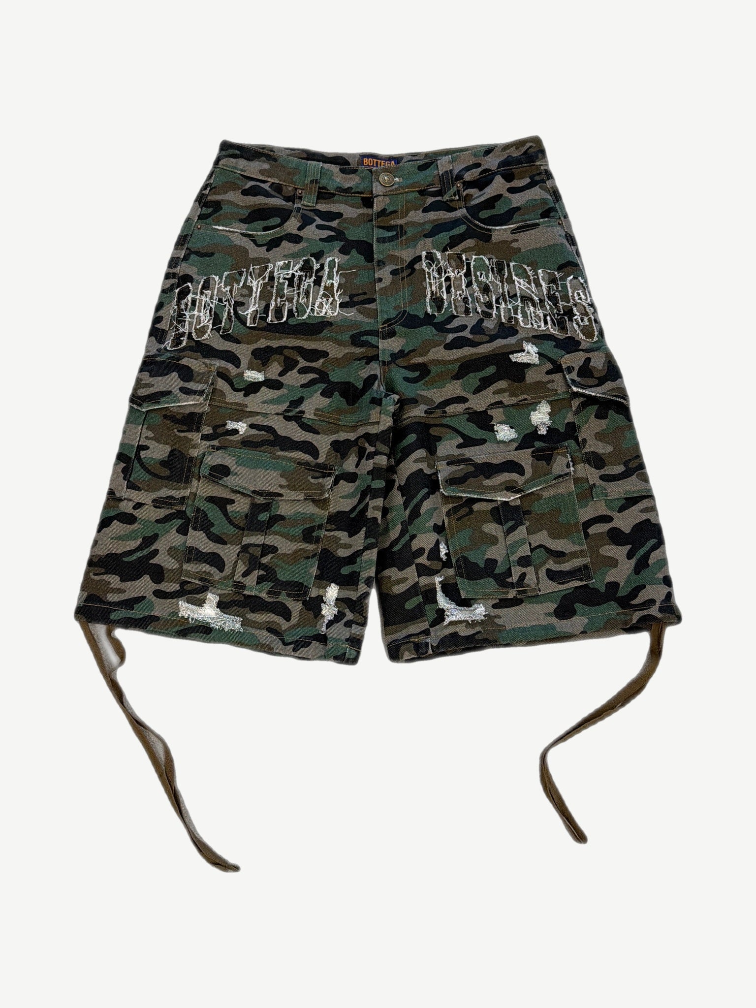 Bottega Desires green woodland camo distressed cargo shorts front view with side flap pockets and raw hem