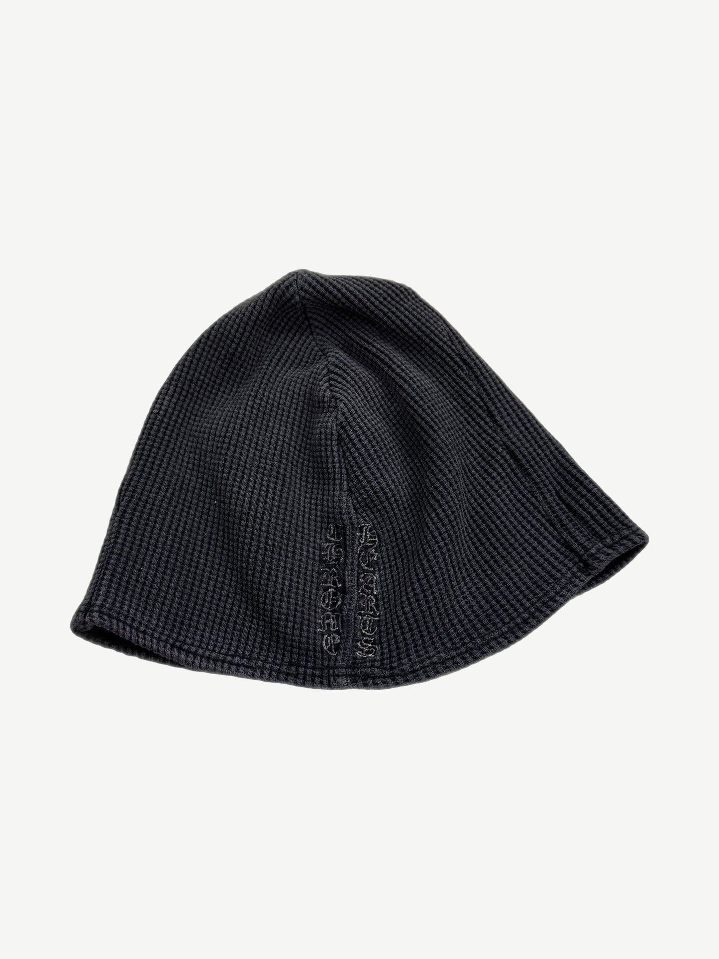 Vintage Chrome Hearts navy thermal beanie side view with tonal vertical Chrome Hearts logo embroidery.
