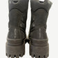 Balenciaga Combat Strike boot rear view with reinforced heel pull tab and debossed branding on chunky outsole.