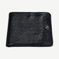 Chrome Hearts black leather bifold wallet front with sterling silver fleur de lis snap button accent