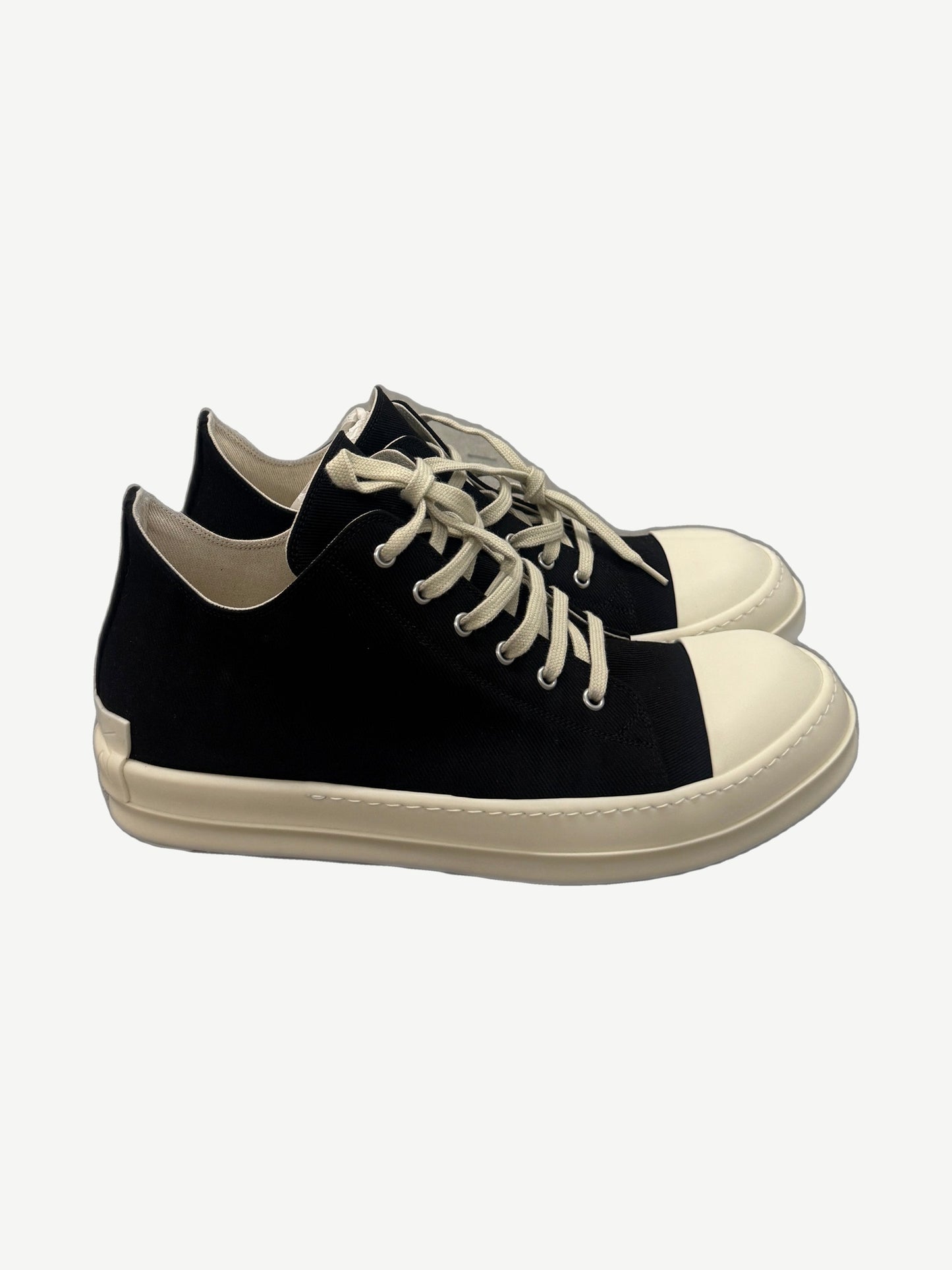 Rick Owens DRKSHDW Concordians black canvas low-top sneaker side profile with cream rubber cap toe and platform sole
